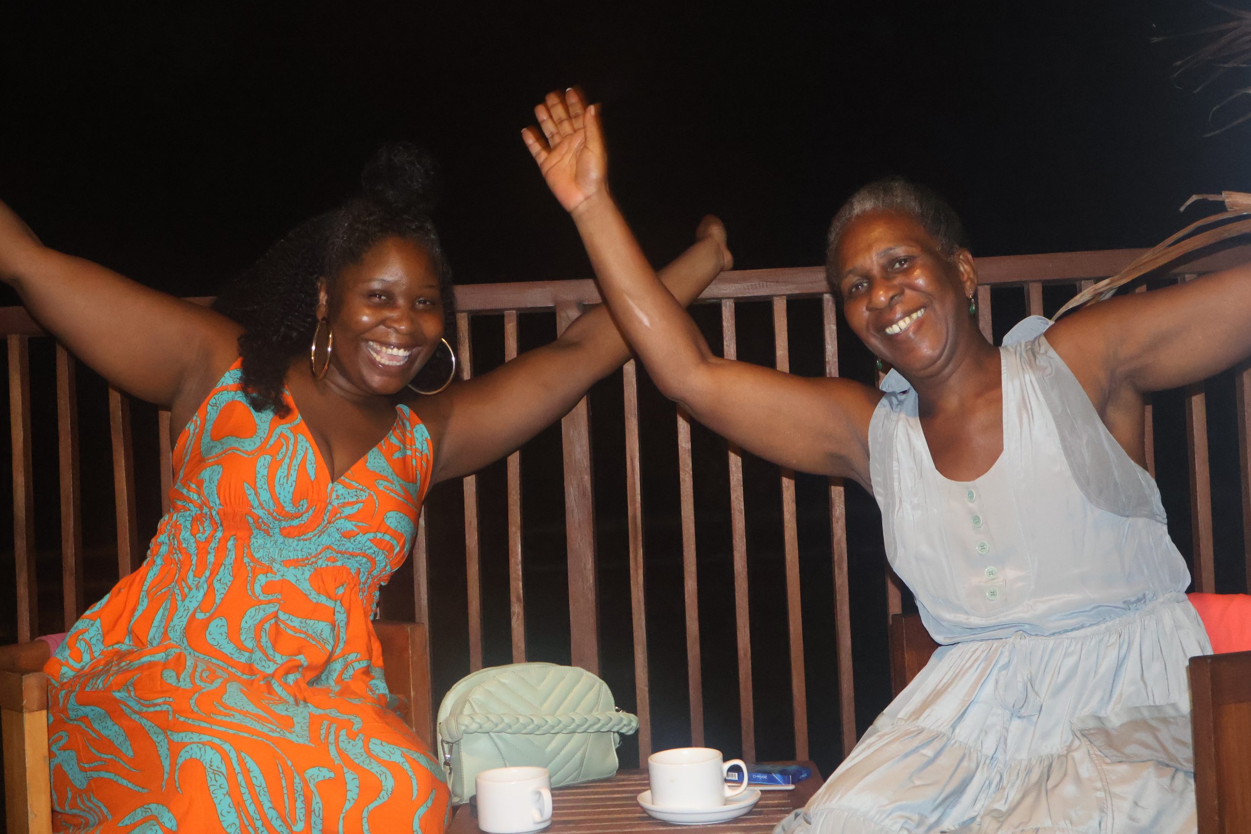 two ladys on the balcony from their hotel