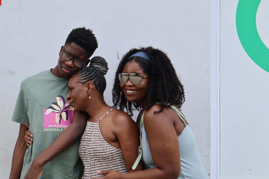 A FAMILY HUGGING IN MOMBASA, KENYA
