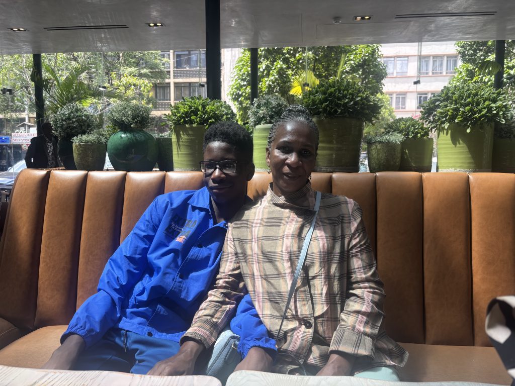 a grandma and son at cjs in nairobi