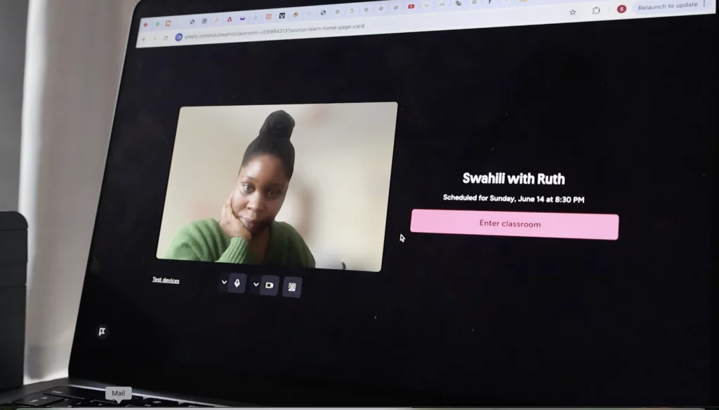 A Photo of a lady on a computer screen waiting for her language lesson to start with Preply.